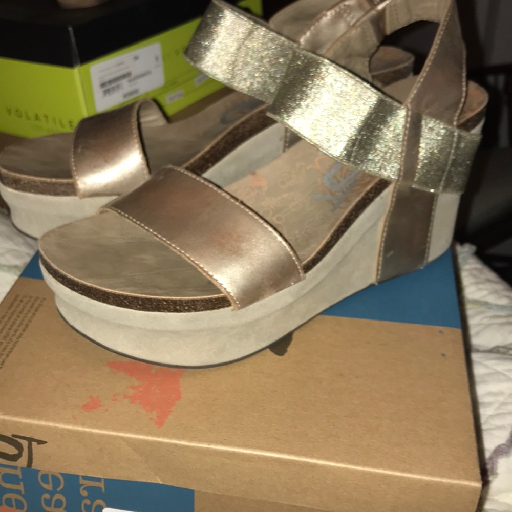 Gold OTBT platform shoes